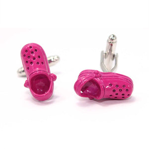 Mancuernillas metalicas en forma de Crocs color rosa